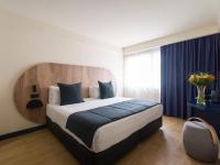 Postel nebo postele na pokoji v ubytování Sercotel Playa Canteras
