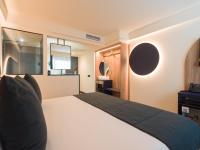 Postel nebo postele na pokoji v ubytování Sercotel Playa Canteras