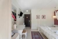 TV a/nebo společenská místnost v ubytování Aerinon Guesthouse