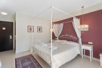 Postel nebo postele na pokoji v ubytování Aerinon Guesthouse