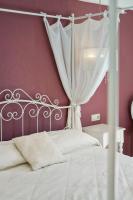 Postel nebo postele na pokoji v ubytování Aerinon Guesthouse