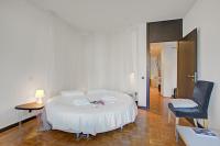 Postel nebo postele na pokoji v ubytování Lugano Luxury - Happy Rentals