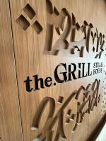 a sign that says the girl on a wooden wall at Al Sawadi Beach Resort & Spa in Barka