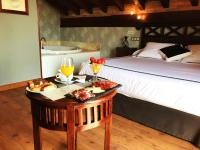 Postel nebo postele na pokoji v ubytování Hotel Spa San Marcos