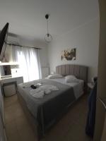 Postel nebo postele na pokoji v ubytování Villa Theo Corfu