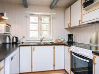 Kuchyň nebo kuchyňský kout v ubytování 14 person holiday home in Ulfborg