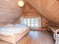 Postel nebo postele na pokoji v ubytování 14 person holiday home in Ulfborg