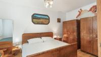 Postel nebo postele na pokoji v ubytování Holiday House Mária