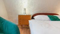 Postel nebo postele na pokoji v ubytování Holiday House Mária