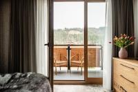 Postel nebo postele na pokoji v ubytování Hotel Litworowy Staw