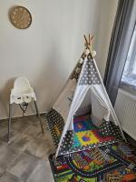Postel nebo postele na pokoji v ubytování Rodinný apartmán U Kuby