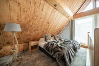 Postel nebo postele na pokoji v ubytování Hotel Litworowy Staw