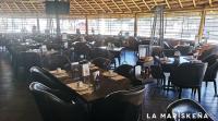 uma sala de jantar cheia de mesas e cadeiras em Loft de Lujo en Torre Punta Mayor frente a Plaza Mayor en León Gto em Miravalle