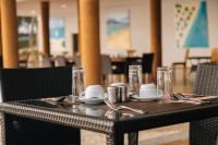 En restaurant eller et andet spisested på Royal Mandarin Hotel & Resort Zanzibar