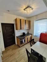 A kitchen or kitchenette at Amstetten Apartment