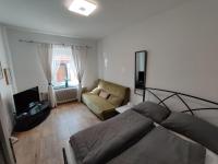 A television and/or entertainment centre at Amstetten Apartment
