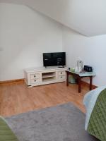 Charlestown bungalowにあるテレビまたはエンターテインメントセンター