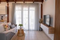 A television and/or entertainment centre at Michalis Apartment with Outdoor Jacuzzi