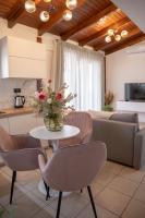 A seating area at Michalis Apartment with Outdoor Jacuzzi