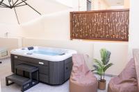 A seating area at Michalis Apartment with Outdoor Jacuzzi