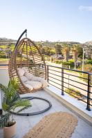 A balcony or terrace at Michalis Apartment with Outdoor Jacuzzi