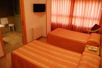 A television and/or entertainment centre at Hotel Santa Faz