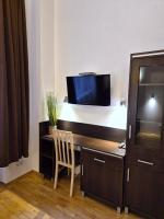 Televízia a/alebo spoločenská miestnosť v ubytovaní Safona - Pantheon Apartments