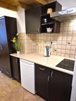Kuchyňa alebo kuchynka v ubytovaní Safona - Pantheon Apartments