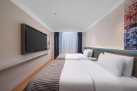 CityNote Hotel -Guangzhou Beijing Road Pedestrian Street Yuexiu Park Branchにあるベッド