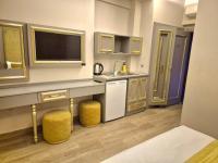 Kuchyň nebo kuchyňský kout v ubytování Taksim La Marino Hotel