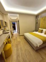 Postel nebo postele na pokoji v ubytování Taksim La Marino Hotel