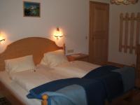 Łóżko lub łóżka w pokoju w obiekcie Ferienwohnung Mützengruß