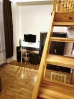 Televízia a/alebo spoločenská miestnosť v ubytovaní Safona - Pantheon Apartments