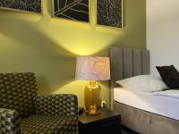 Posteľ alebo postele v izbe v ubytovaní Hotel Zlatý Býk