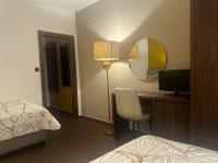 Posteľ alebo postele v izbe v ubytovaní Hotel Zlatý Býk