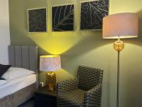 Posteľ alebo postele v izbe v ubytovaní Hotel Zlatý Býk