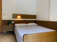 Posteľ alebo postele v izbe v ubytovaní Locanda La Ruscoletta