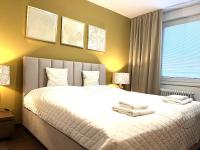 Posteľ alebo postele v izbe v ubytovaní Hotel Zlatý Býk