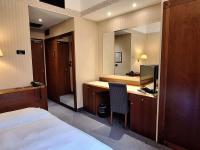 Posteľ alebo postele v izbe v ubytovaní Mercure Reggio Emilia Centro Astoria