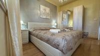 Posteľ alebo postele v izbe v ubytovaní Villa Claudia