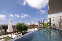 Bazén v ubytování Greenvale Park Villas by Coastalbliss nebo v jeho okolí