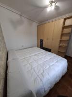 A bed or beds in a room at Casa La Sinagoga de Trujillo