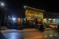 a car parked in front of a building at night at Aylane Hotel in Nampula