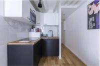 Kuchnia lub aneks kuchenny w obiekcie Home Suite Home Grands Boulevards 41