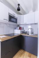 Kuchnia lub aneks kuchenny w obiekcie Home Suite Home Grands Boulevards 41