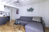 Część wypoczynkowa w obiekcie Home Suite Home Grands Boulevards 41