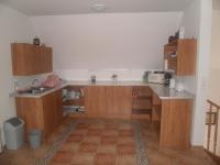 A kitchen or kitchenette at Gulyás Vendégház