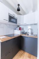 Kuchnia lub aneks kuchenny w obiekcie Home Suite Home Grands Boulevards 41