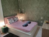 Postel nebo postele na pokoji v ubytování Apartament MaxMax