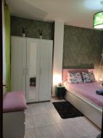 Postel nebo postele na pokoji v ubytování Apartament MaxMax